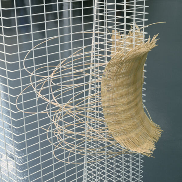 Three images from Claire Barclay's exhibition in DCA. In one picture, jute material is attached to wire. In another, a person stands in DCA Galleries looking at large, abstract sculpture that form the exhibition. In the third picture, terracotta pots sit on a white bench.