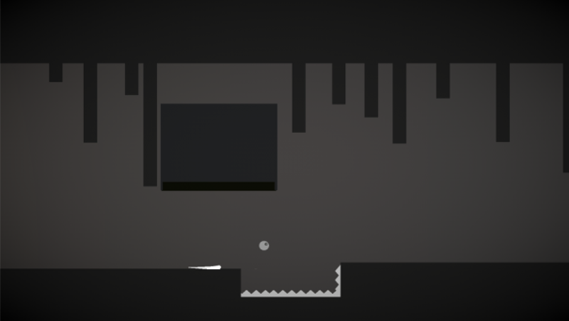 A screen grab from the game Strata. A small circle jumps over spikes in a black-and-white world.