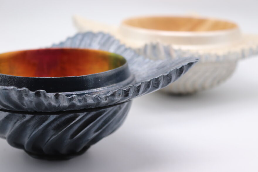 Close up of two decorative wooden bowls