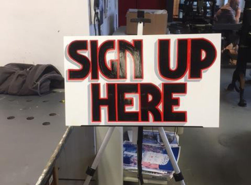 Sign Up Here painted sign