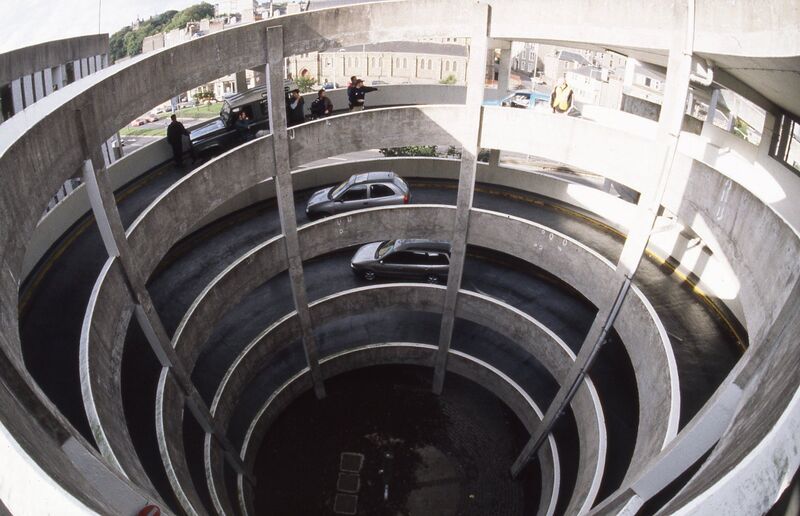 A film still from Roderick Buchanan's exhibition of a spiral road in a multi-story carpark.