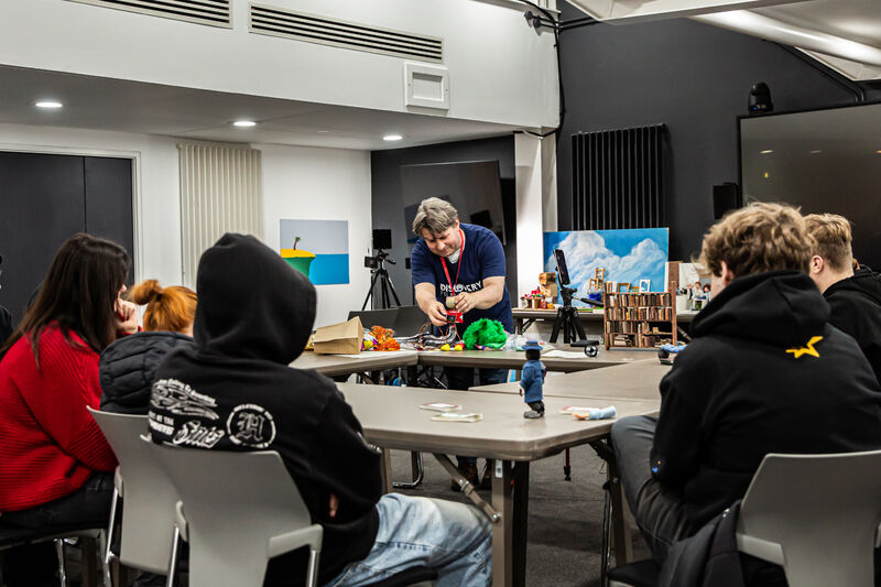 Teacher demonstrating stop motion animation to class at DCA