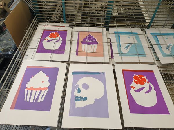 Screen prints of cakes and skull