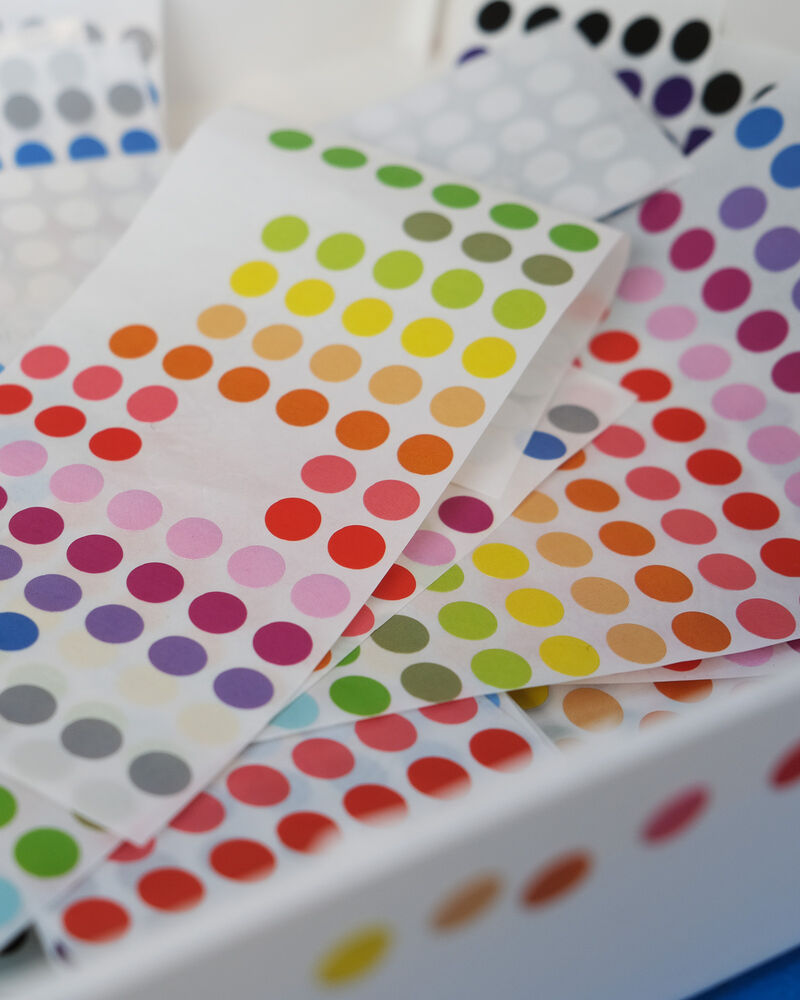 Sheets of colourful round stickers