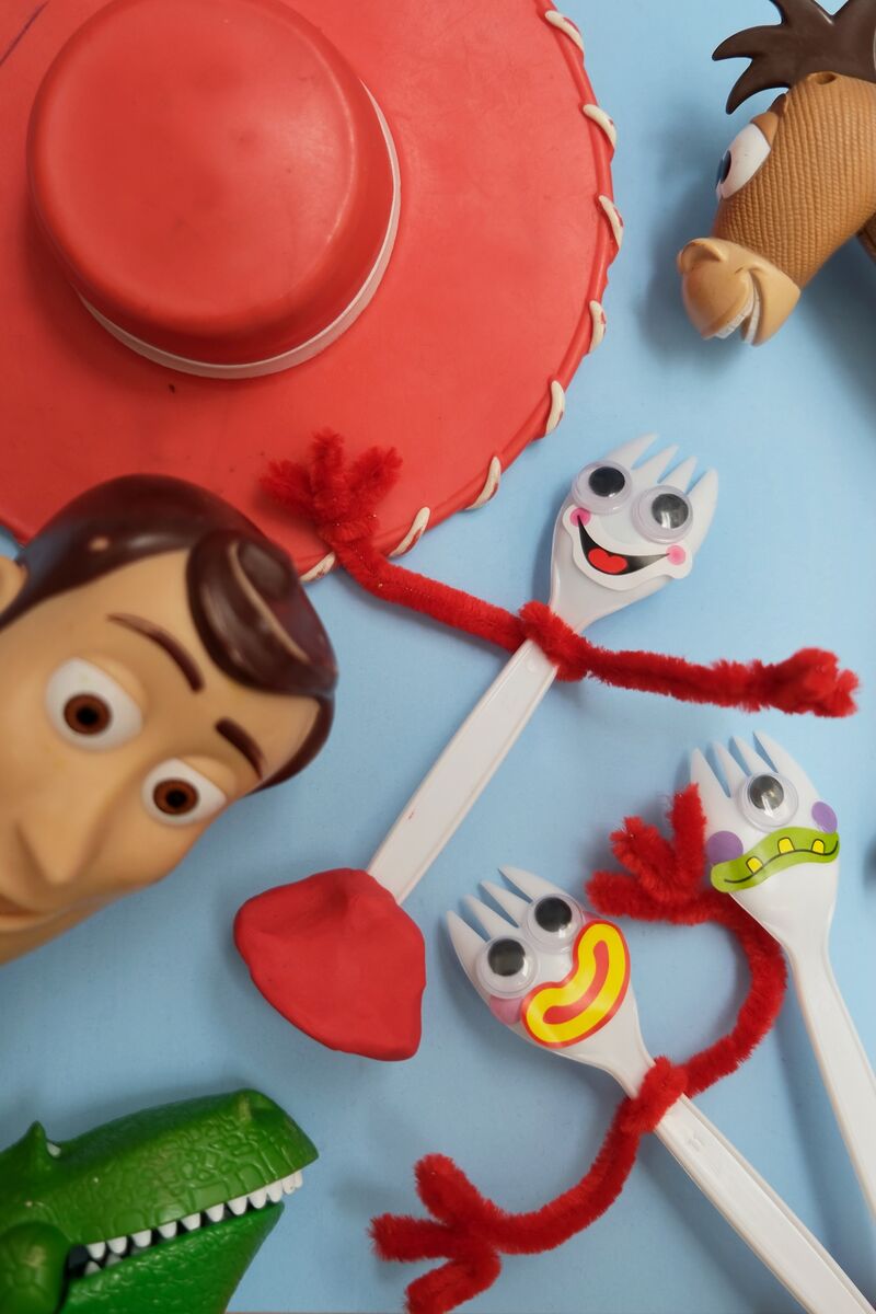 Forky toy characters surrounded by Toy Story toys