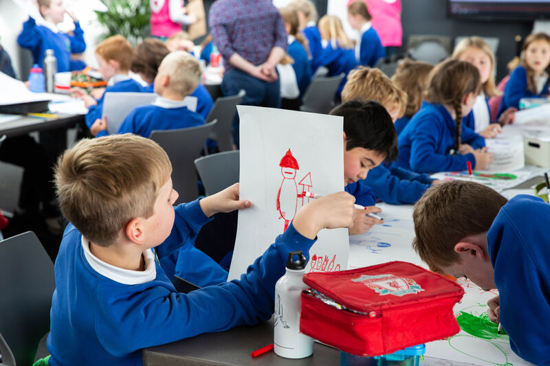 School group doing drawing activities in DCA Meeting Room