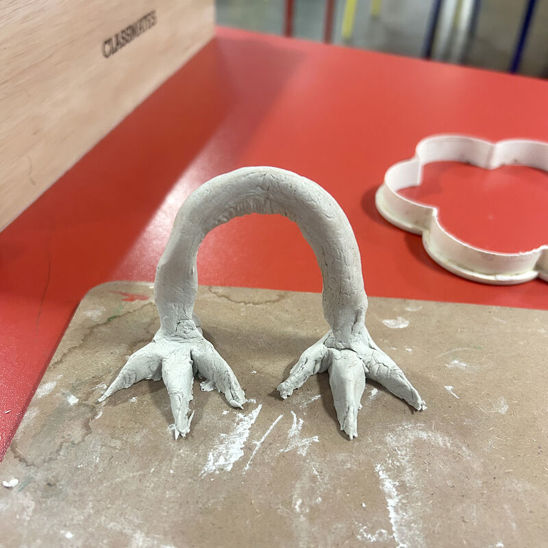 Clay figure of chicken feet