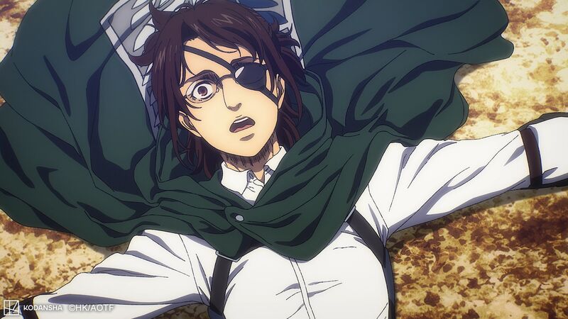 An anime still shows a person with an eyepatch and a cape lying on the ground.