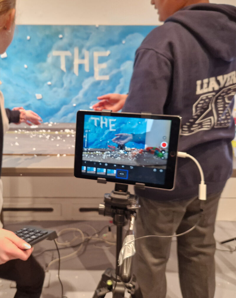 Two young people doing stop motion animation