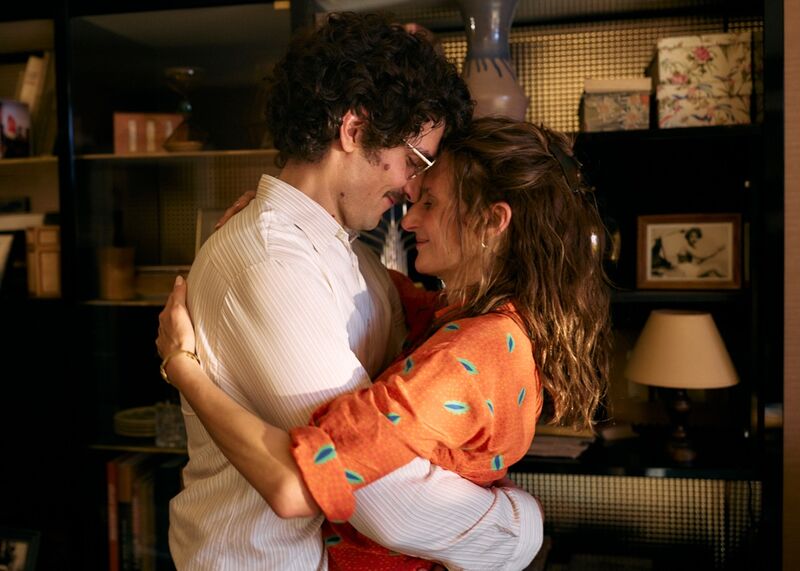 A man and woman embrace