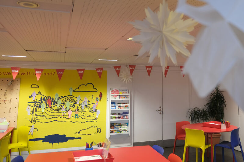 Create Space with paper stars hanging from the ceiling