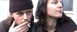 Two people smoking