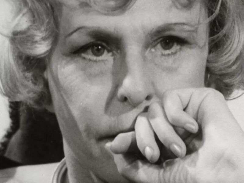 A close-up black-and-white image of Leni Riefenstahl