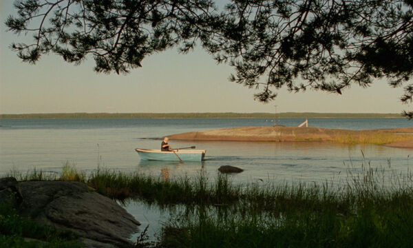 A girl rows a boat