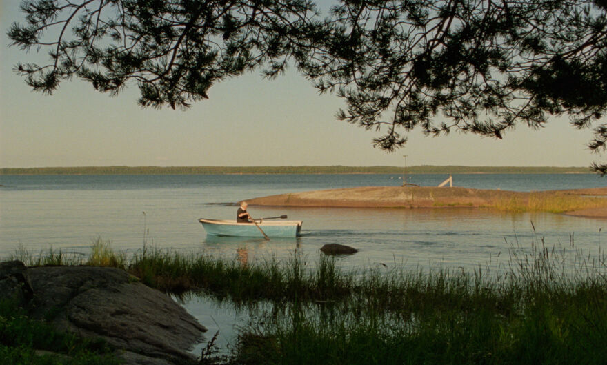 A girl rows a boat