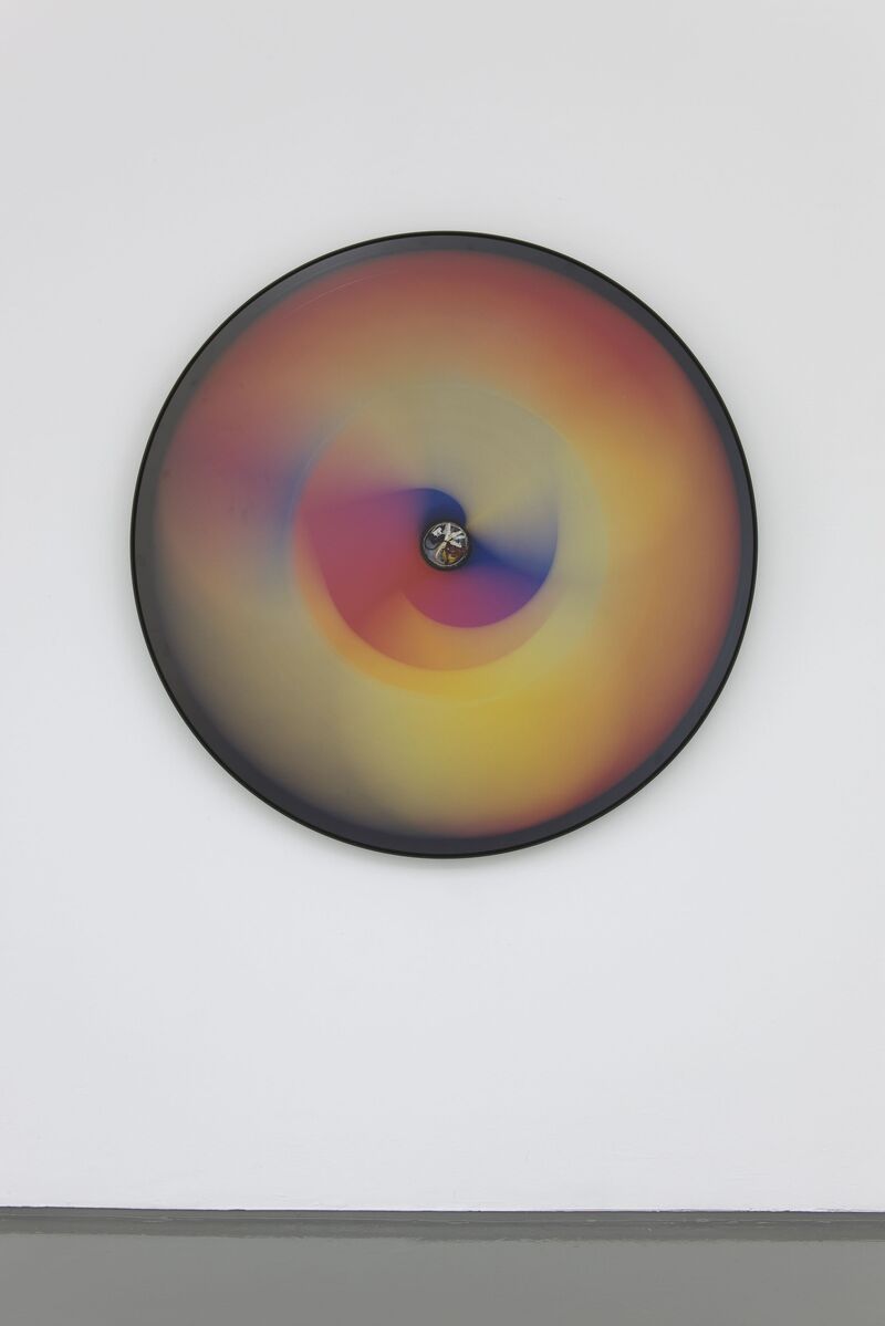 A multi-coloured wheel is spun in Nina Rhode's exhibition, creating a blend of orange, pink, green and blue.