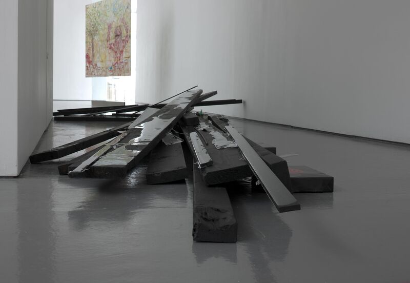 From Jutta Koether's exhibition. Black wood, driftwood and glass lie on DCA floors in a state of disarray. 