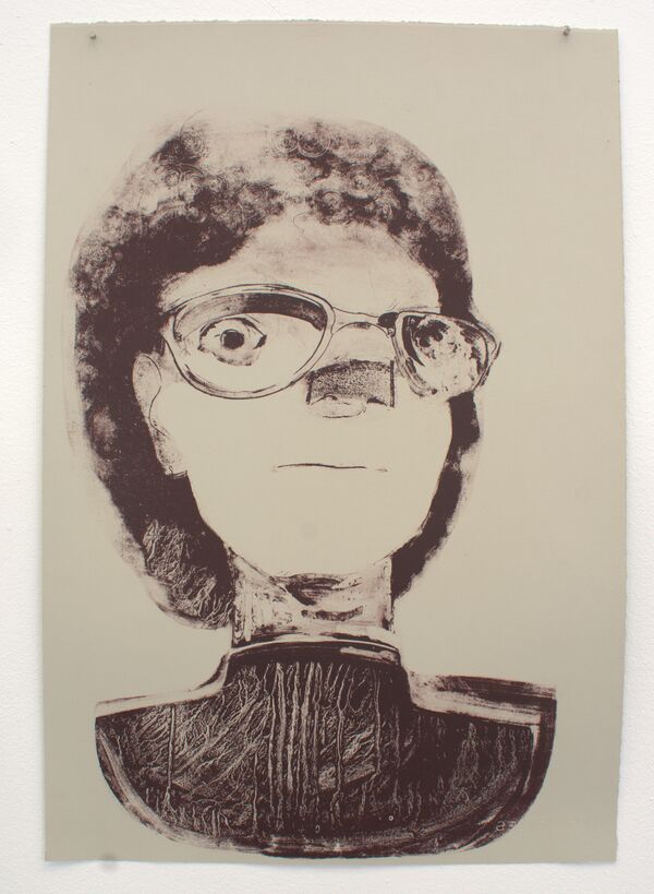 Print of a woman wearing glasses