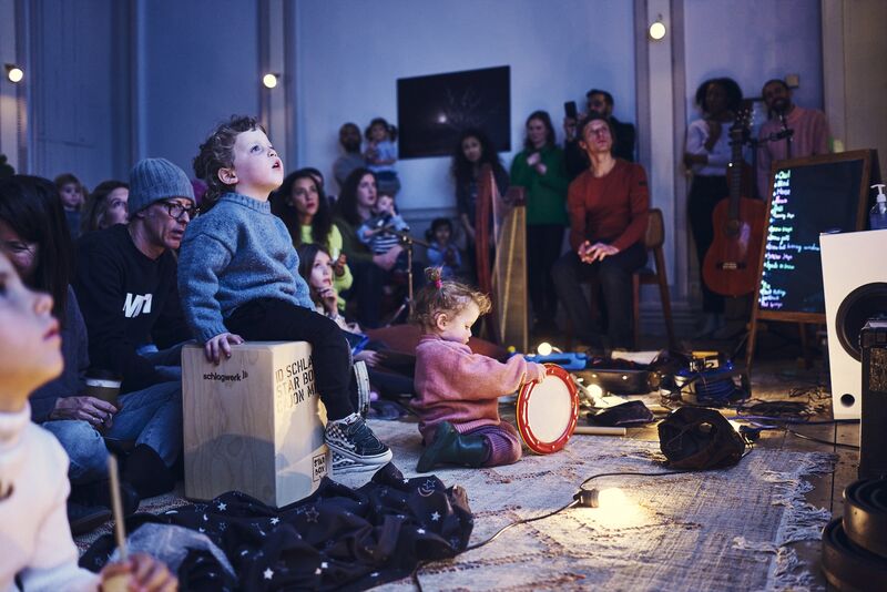Children playing instruments at The Enchanted Cinema