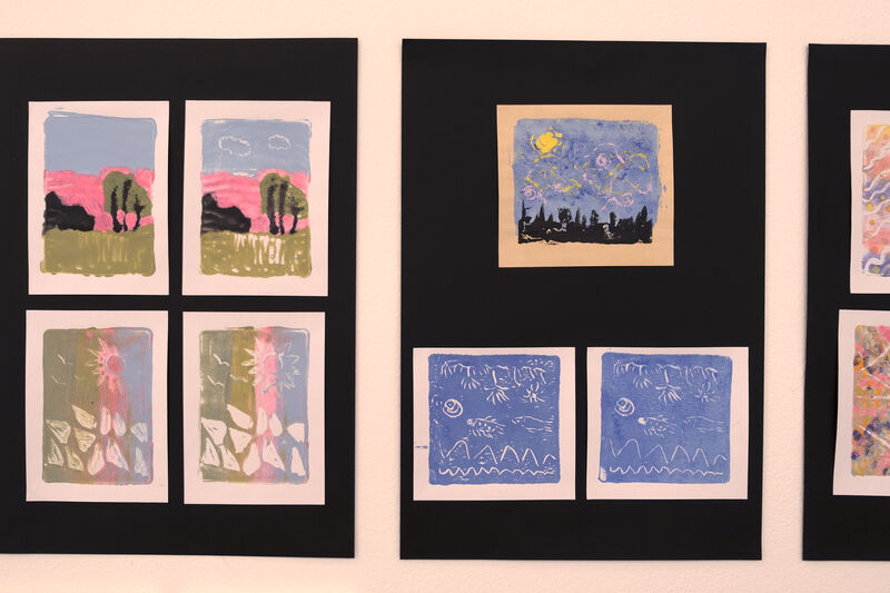 Colourful prints of landscapes on the wall of Gallery 1 for Spring Holiday Pop-up
