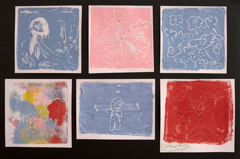 collection of colourful prints made by children