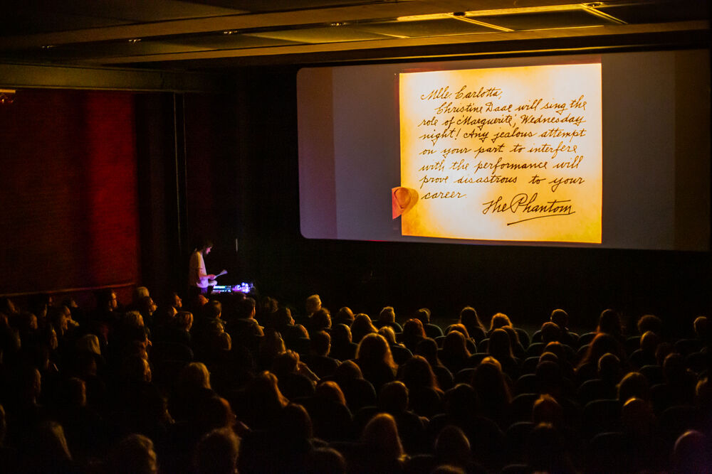Audience watching The Phantom of the Opera while Andrew Wasylyk and Tommy Perman play their live score