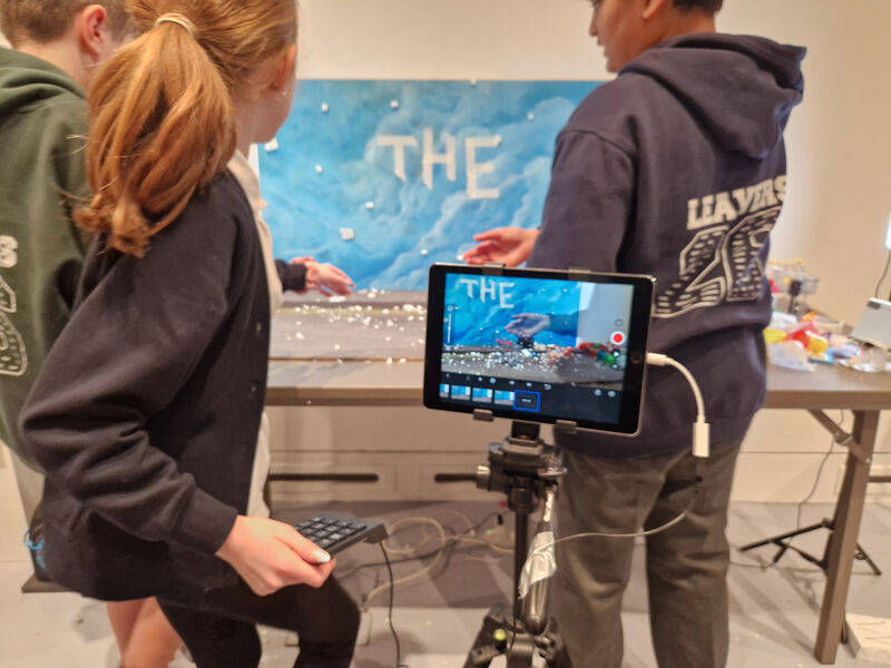 School pupils making an End credit for their animation
