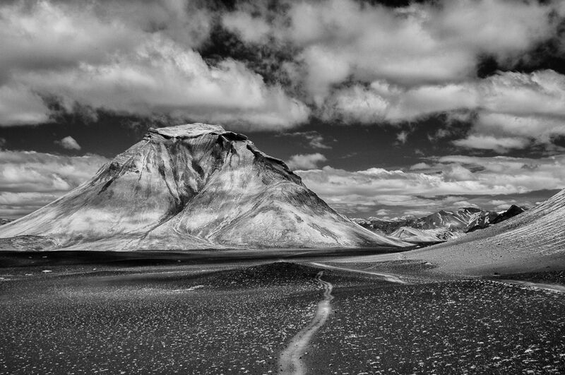 Black and white photograph of a landscape with mountains