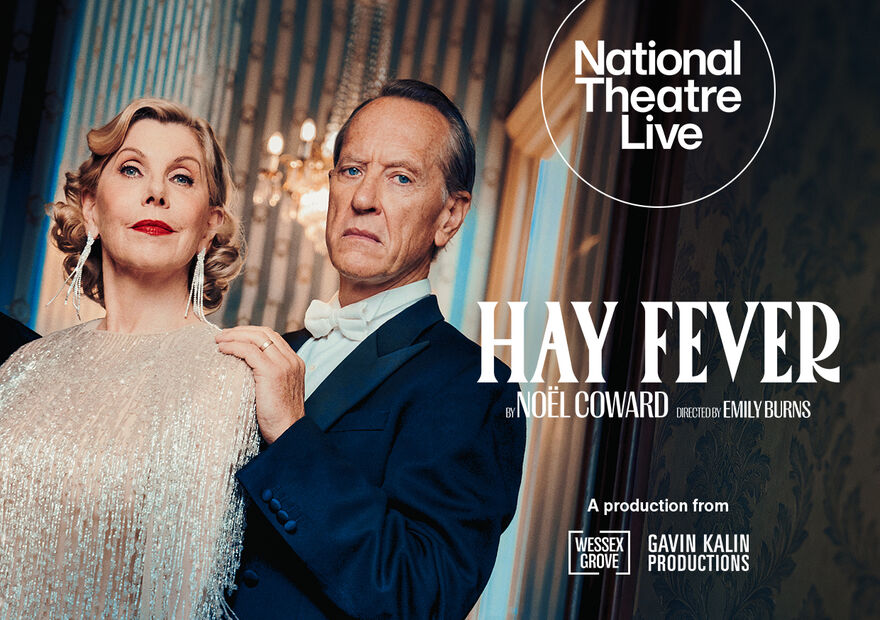 A well dressed woman and man look to camera in this promotion for National Theatre Live's production of Hay Fever