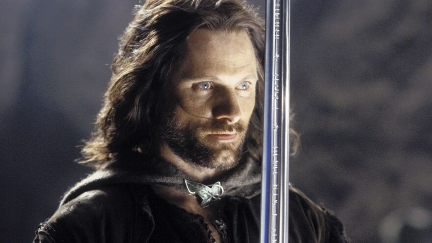 Aragorn holds a sword in Return of the King.