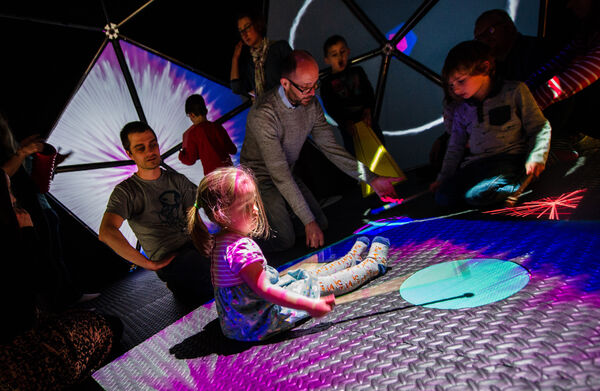 Young girls playing with soundplay equipment